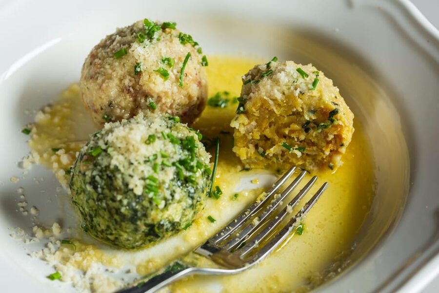 Innsbruck: Walking Traditional Food Tour - The hot first-course stop: Käsespätzle, Tiroler Gröstl, or gulasch and knödel