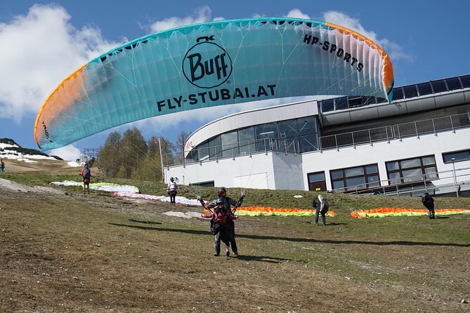 Paragliding in the morning - Landing in a wide meadow, then you get to keep the proof