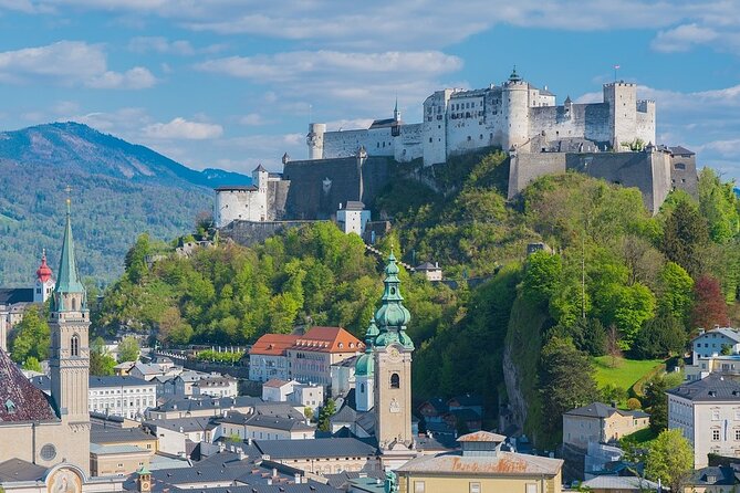 Private Full Day Trip to Hallstatt ,Salzburg and Melk from Vienna - Traunsee: Austria’s deepest lake, for calm water and mountain views