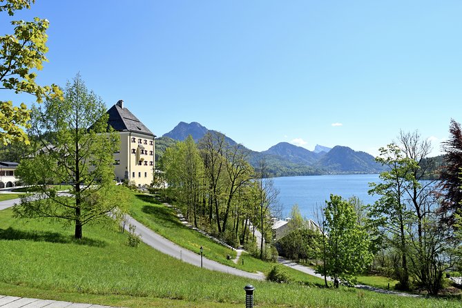 Private Lake District, St. Wolfgang and St. Gilgen Tour - Rosewood Schloss Fuschl and the Fuschlsee: a calm first hit of emerald water