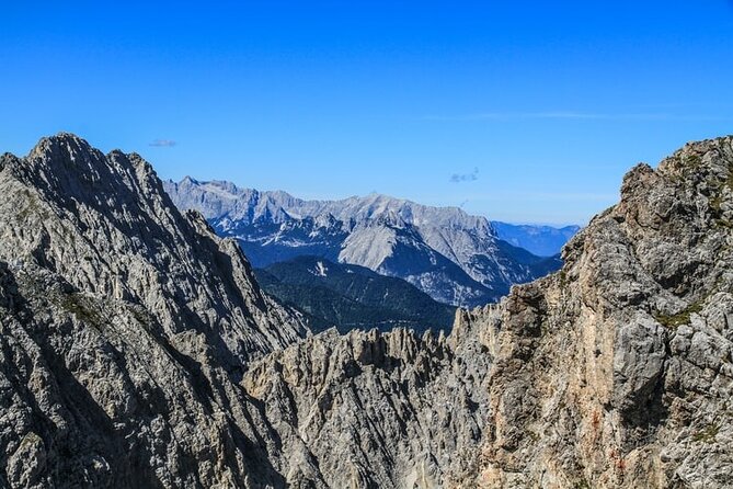 Self-Guided 1,5-hour Tour of Innsbruck: Exciting Stories, Photo Spots & Desserts - Imperial Innsbruck: Hofburg, gardens, Hofkirche, Ottoburg, and St Jakob
