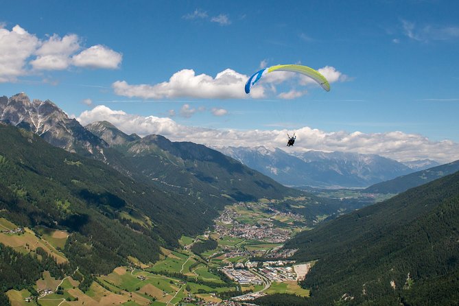 Tandem Paragliding Tirol, Austria - In the air above Stubai Glacier and Innsbruck