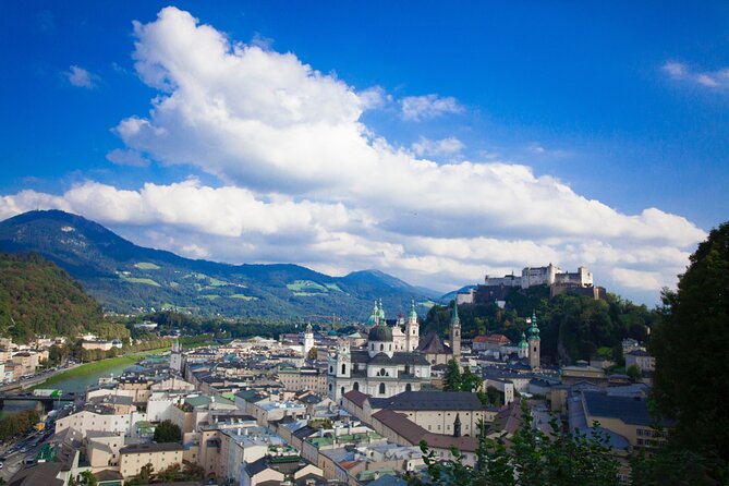 Transfer from Vienna to Salzburg with 2 hours for sightseeing - The Driver: English-Speaking, Local, and a Key Difference From a Licensed Guide