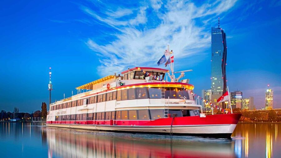 Vienna: 3.5-Hour Danube 70s, 80s, 90s Party Cruise w/ Dinner - The 70s, 80s, 90s Soundtrack With DJ Mel Merio