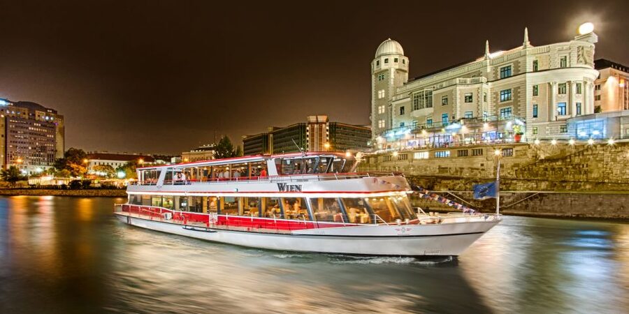Vienna: Evening Cruise Along The Danube - Vienna glowing from the upper deck, plus the live-cam screen trick