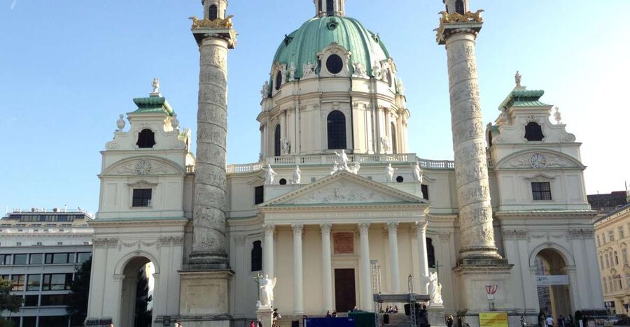 Vienna: Guided E-Bike Tour - Meeting near Karlskirche and rolling into the old city