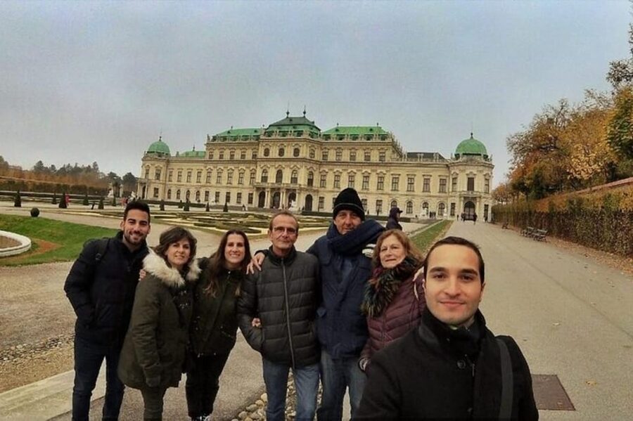Vienna: Highlights Walking Tour with a Local Guide - Burgtor: an arch, a defense wall, and a Napoleon-shaped story