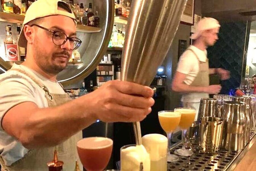 Vienna Nightlife: Food, Wine, Cocktails and Rooftop Bar Tour - Starting at Karlskirche, then learning Vienna’s nightlife rhythm